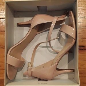 High heeled strappy shoes